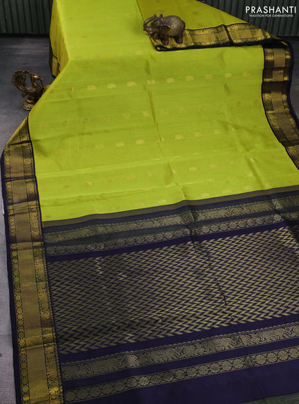 Kuppadam silk cotton saree lime green and navy blue with annam zari woven buttas and zari woven border