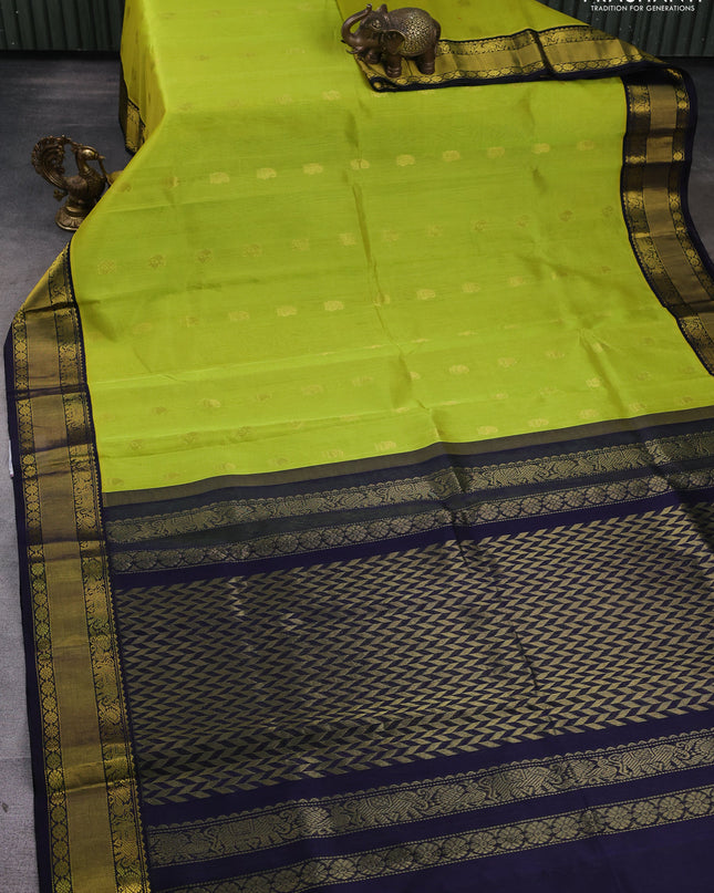 Kuppadam silk cotton saree lime green and navy blue with annam zari woven buttas and zari woven border