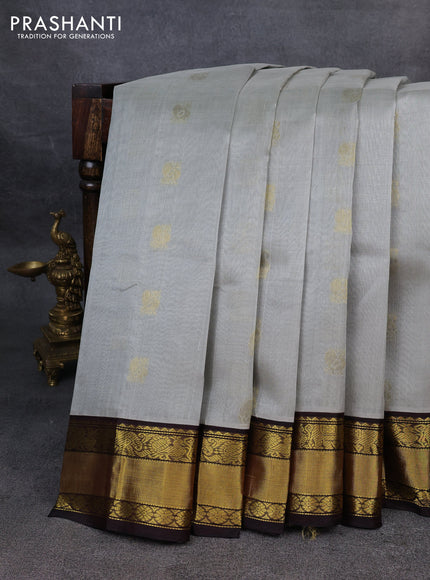 Kuppadam silk cotton saree grey and deep coffee brown with annam zari woven buttas and zari woven border