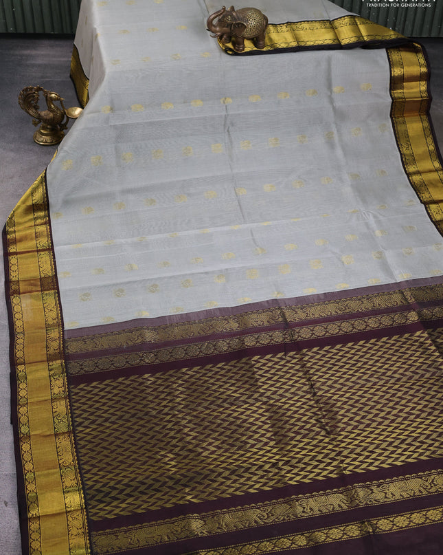 Kuppadam silk cotton saree grey and deep coffee brown with annam zari woven buttas and zari woven border