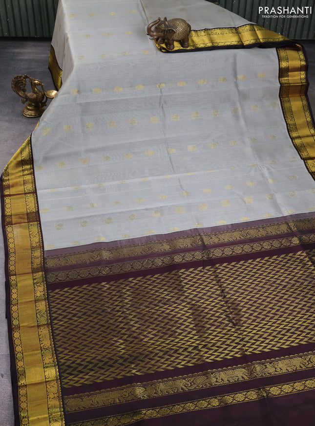 Kuppadam silk cotton saree grey and deep coffee brown with annam zari woven buttas and zari woven border