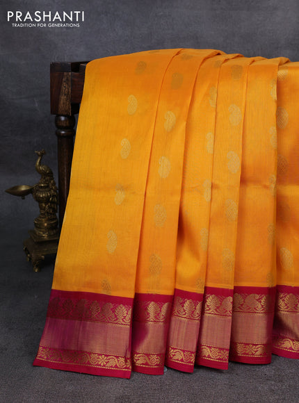Kuppadam silk cotton saree orange and pink with paisley zari woven buttas and zari woven border