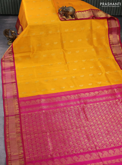 Kuppadam silk cotton saree orange and pink with paisley zari woven buttas and zari woven border