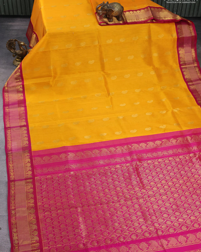 Kuppadam silk cotton saree orange and pink with paisley zari woven buttas and zari woven border