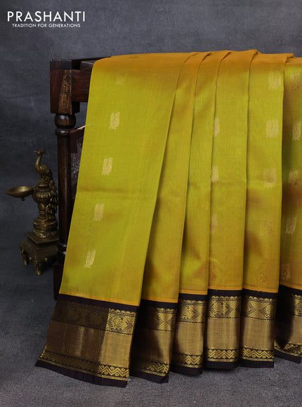 Kuppadam silk cotton saree yellow and coffee brown with annam zari woven buttas and zari woven border