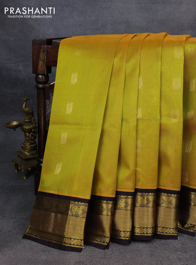 Kuppadam silk cotton saree yellow and coffee brown with annam zari woven buttas and zari woven border