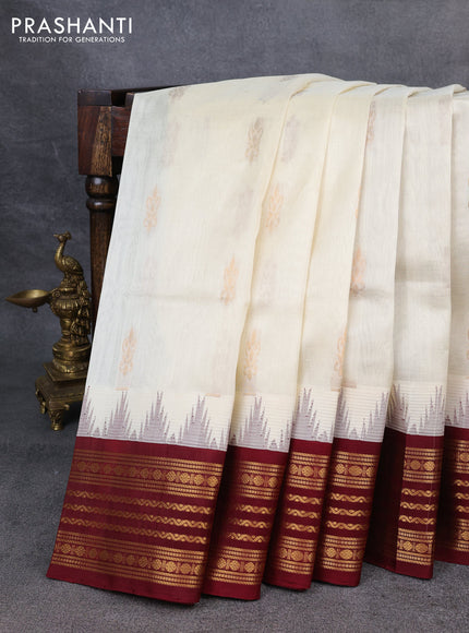 Kuppadam silk cotton saree cream and maroon with zari woven buttas and temple design zari woven border