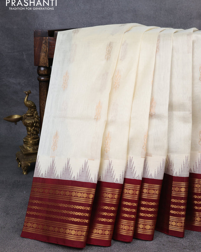 Kuppadam silk cotton saree cream and maroon with zari woven buttas and temple design zari woven border