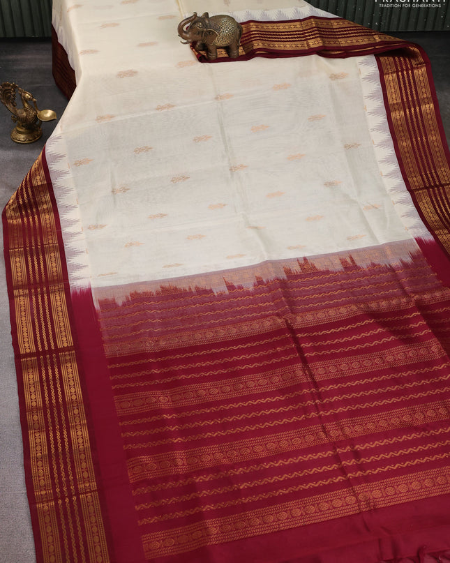 Kuppadam silk cotton saree cream and maroon with zari woven buttas and temple design zari woven border
