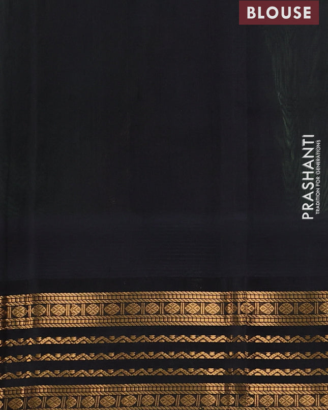 Kuppadam silk cotton saree pastel green and black with zari woven buttas and temple design zari woven border