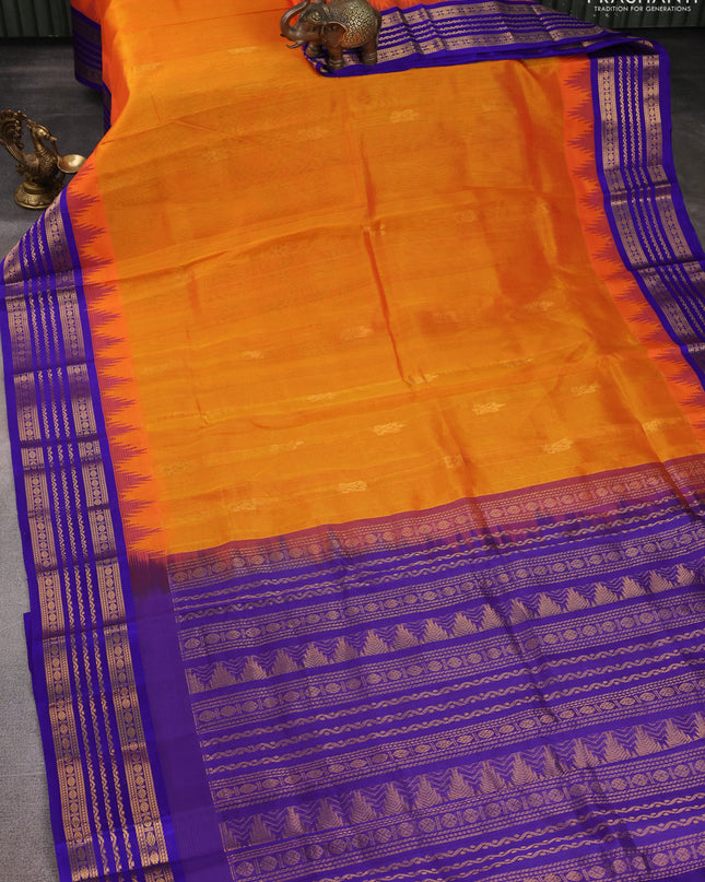 Kuppadam silk cotton saree orange and blue with zari woven buttas and temple design zari woven border