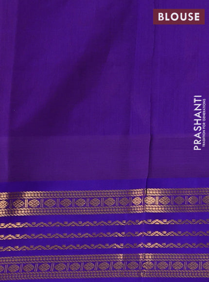 Kuppadam silk cotton saree orange and blue with zari woven buttas and temple design zari woven border