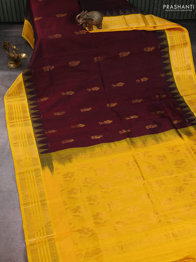 Kuppadam silk cotton saree deep maroon and yellow with zari woven buttas and temple design zari woven border