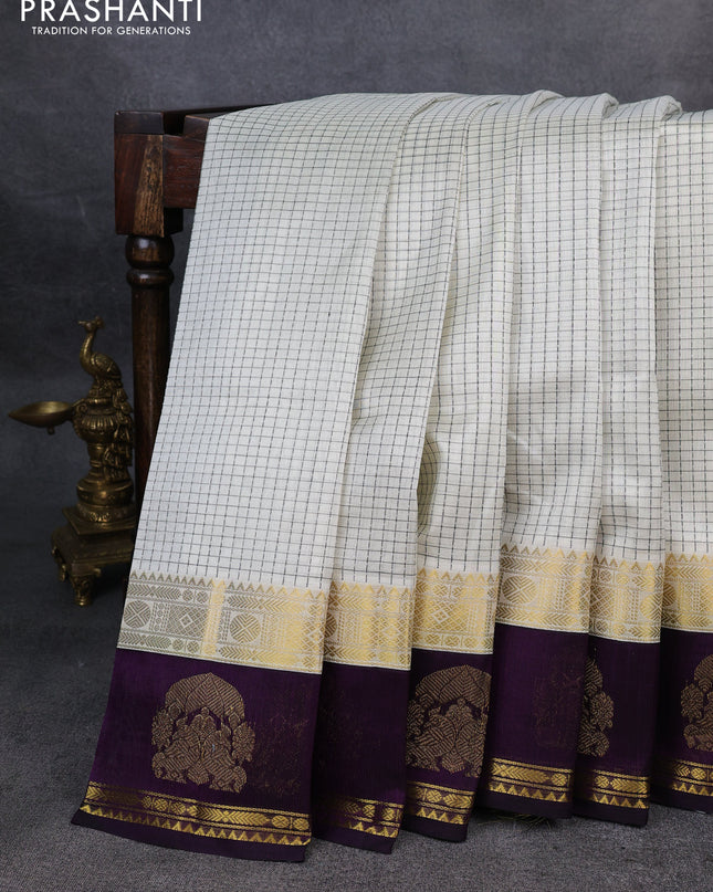 Kuppadam silk cotton saree cream and violet with allover thread woven checked pattern and rettapet zari woven border