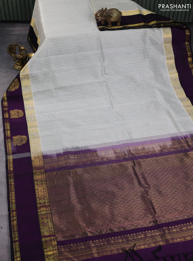 Kuppadam silk cotton saree cream and violet with allover thread woven checked pattern and rettapet zari woven border
