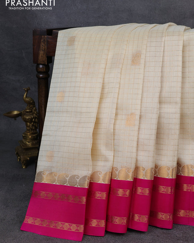 Kuppadam silk cotton saree cream and blue with allover zari checks & buttas and rettapet zari woven border