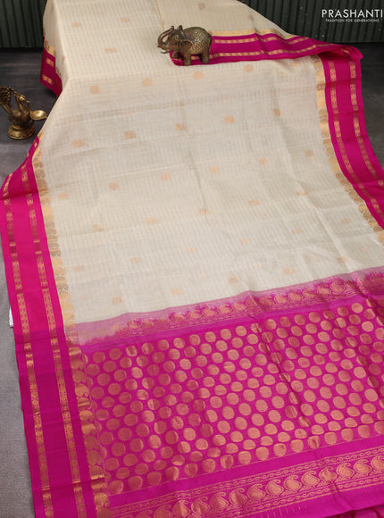 Kuppadam silk cotton saree cream and blue with allover zari checks & buttas and rettapet zari woven border