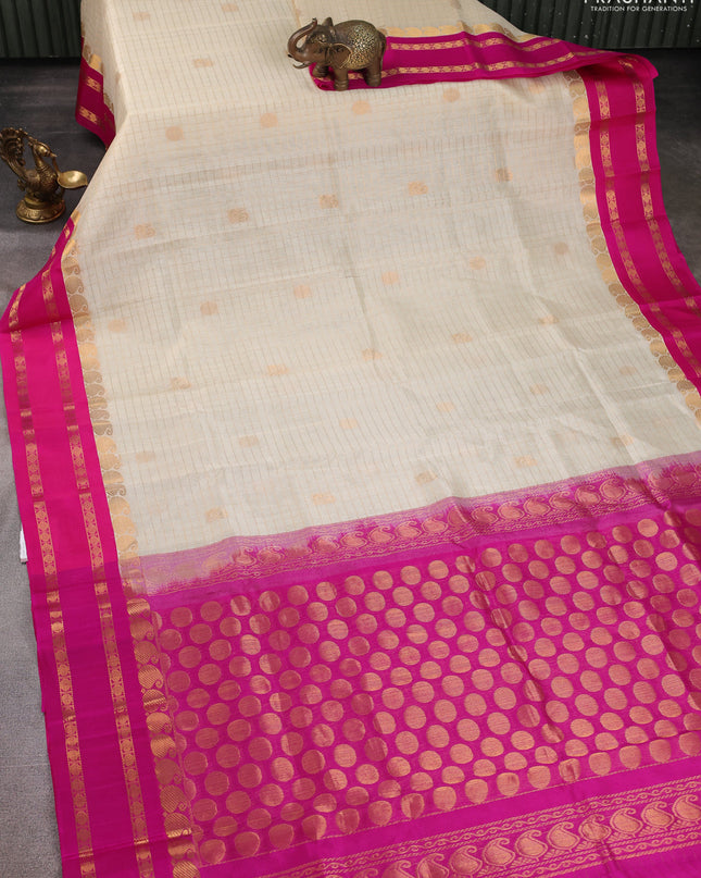 Kuppadam silk cotton saree cream and blue with allover zari checks & buttas and rettapet zari woven border