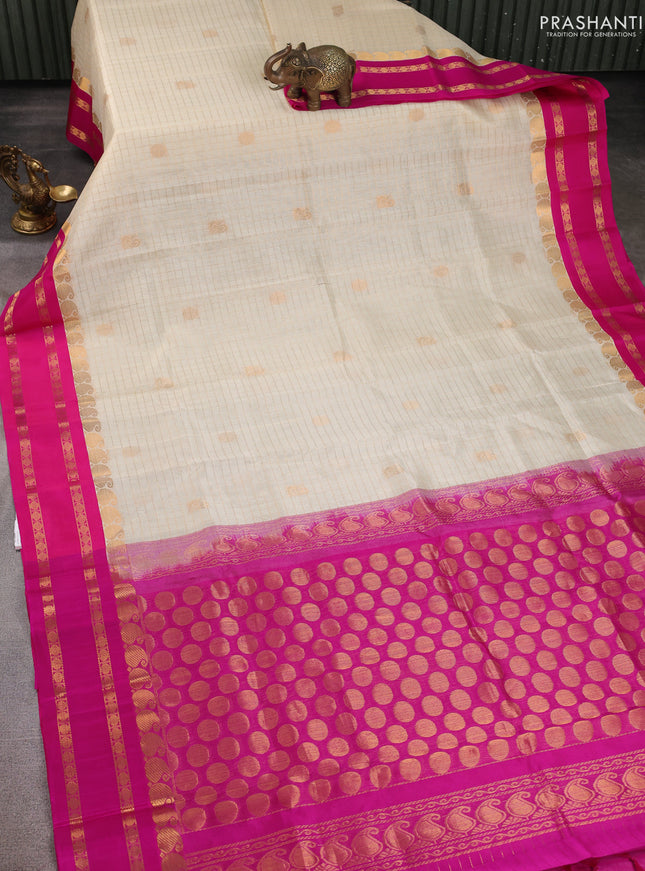 Kuppadam silk cotton saree cream and blue with allover zari checks & buttas and rettapet zari woven border