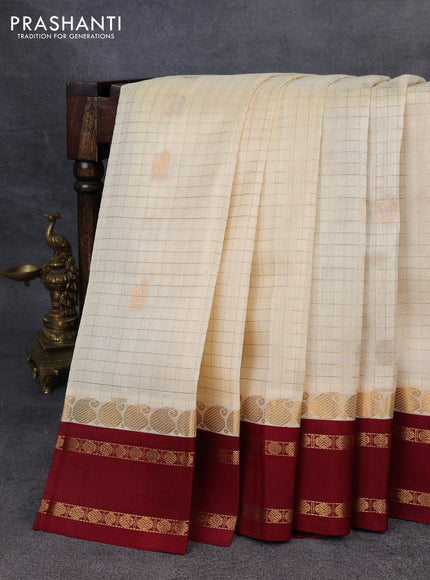 Kuppadam silk cotton saree cream and maroon with allover zari checks & buttas and rettapet zari woven border