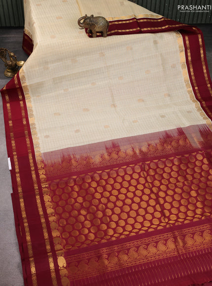 Kuppadam silk cotton saree cream and maroon with allover zari checks & buttas and rettapet zari woven border