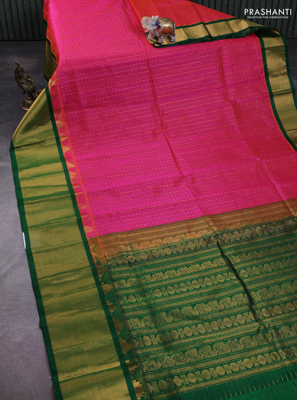 Kuppadam silk cotton saree dual shade of pink and green with allover zari checks & lakshadeepam weaves and temple design zari checked border