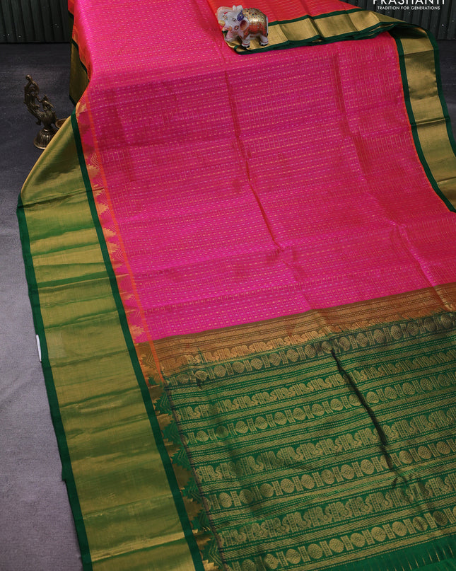 Kuppadam silk cotton saree dual shade of pink and green with allover zari checks & lakshadeepam weaves and temple design zari checked border