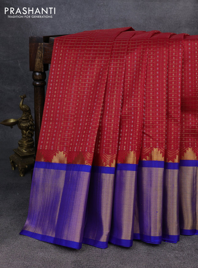 Kuppadam silk cotton saree red and blue with allover zari checks & lakshadeepam weaves and temple design zari checked border