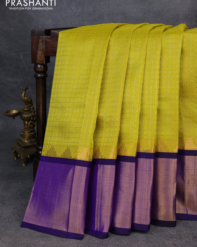 Kuppadam silk cotton saree lime yellow and blue with allover zari checks & lakshadeepam weaves and temple design zari checked border