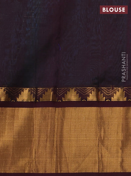 Kuppadam silk cotton saree teal blue and deep maroon with allover zari checks & lakshadeepam weaves and temple design zari checked border