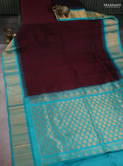Kuppadam silk cotton saree deep maroon and teal blue with plain body and temple design zari checked border