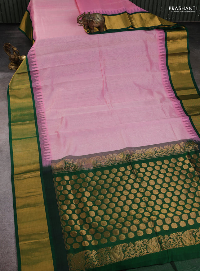 Kuppadam silk cotton saree pastel pink and green with plain body and temple design zari checked border