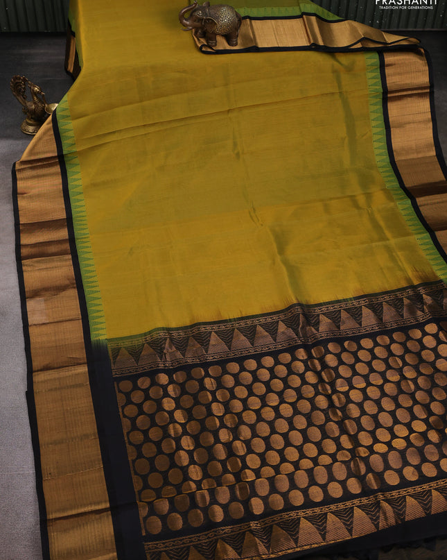 Kuppadam silk cotton saree lime green and black with plain body and temple design zari checked border