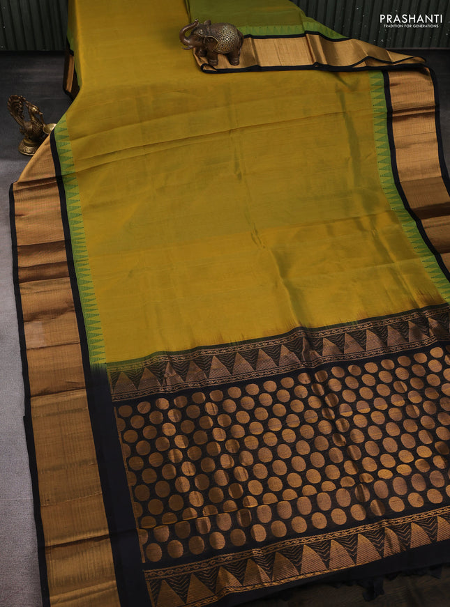 Kuppadam silk cotton saree lime green and black with plain body and temple design zari checked border