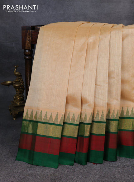 Kuppadam silk cotton saree sandal and green with plain body and temple design zari checked border