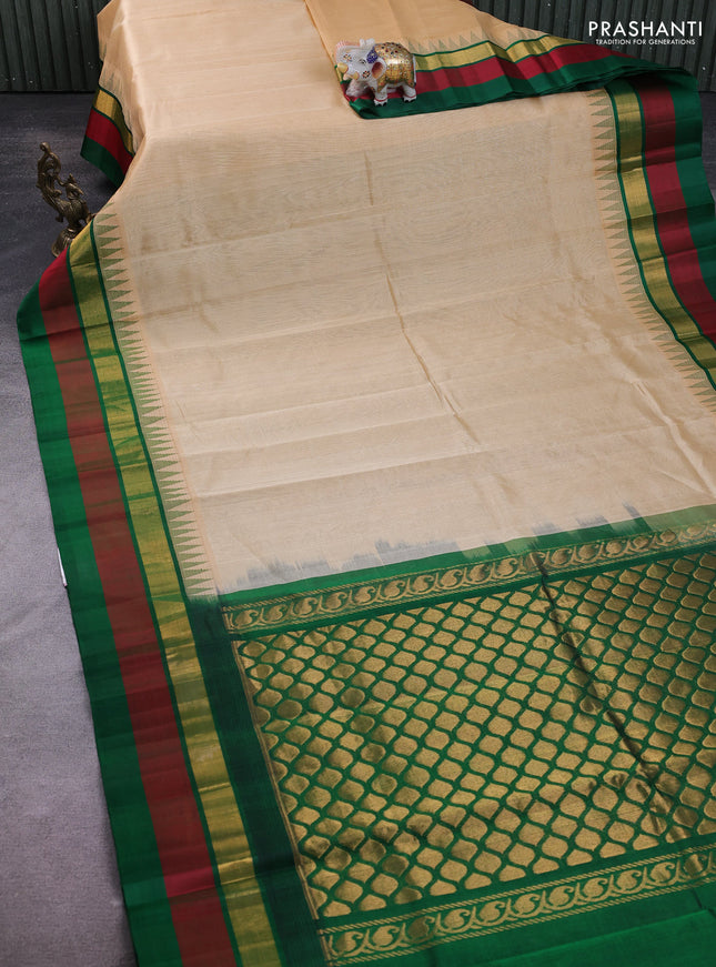 Kuppadam silk cotton saree sandal and green with plain body and temple design zari checked border