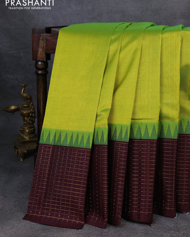 Kuppadam silk cotton saree light green and deep maroon with plain body and temple design zari checked border