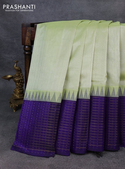 Kuppadam silk cotton saree pista green and blue with plain body and temple design zari checked border