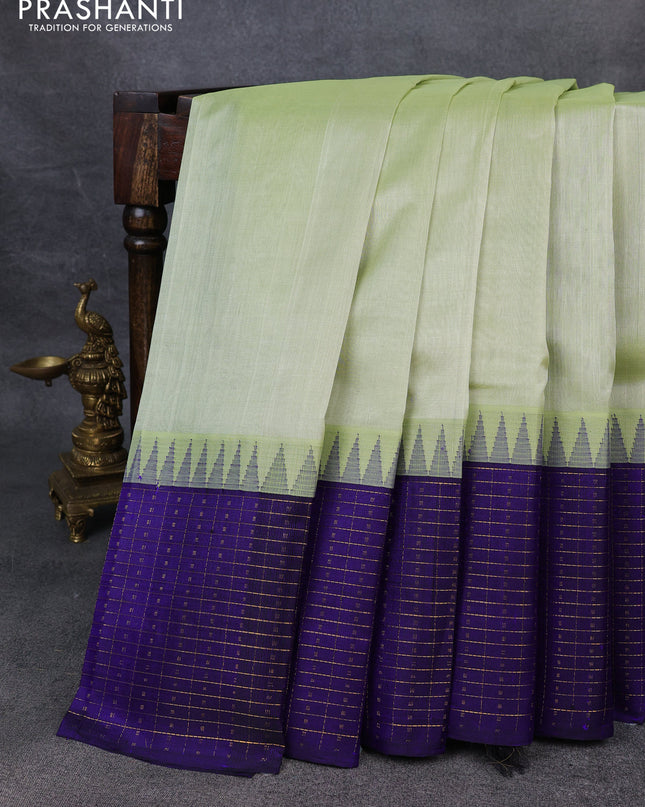 Kuppadam silk cotton saree pista green and blue with plain body and temple design zari checked border
