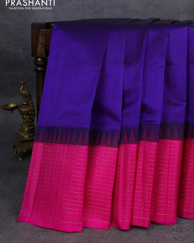 Kuppadam silk cotton saree navy blue and pink with plain body and temple design zari checked border