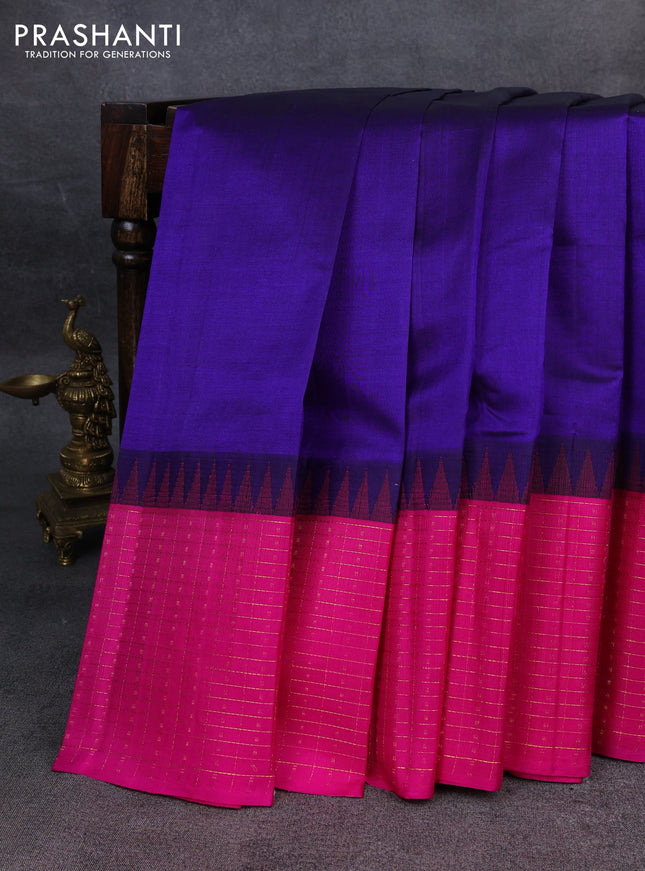 Kuppadam silk cotton saree navy blue and pink with plain body and temple design zari checked border