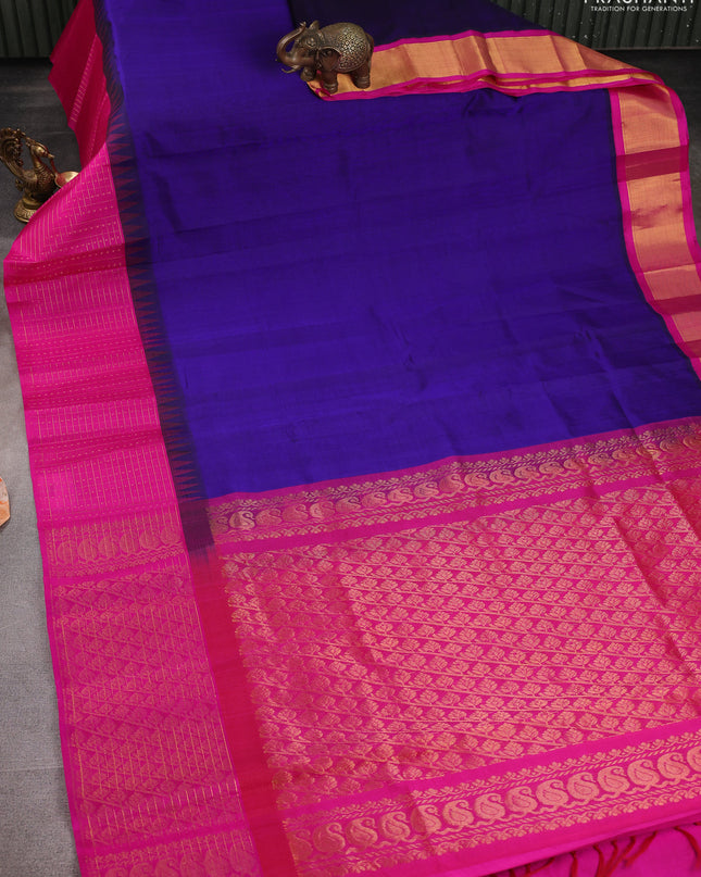 Kuppadam silk cotton saree navy blue and pink with plain body and temple design zari checked border