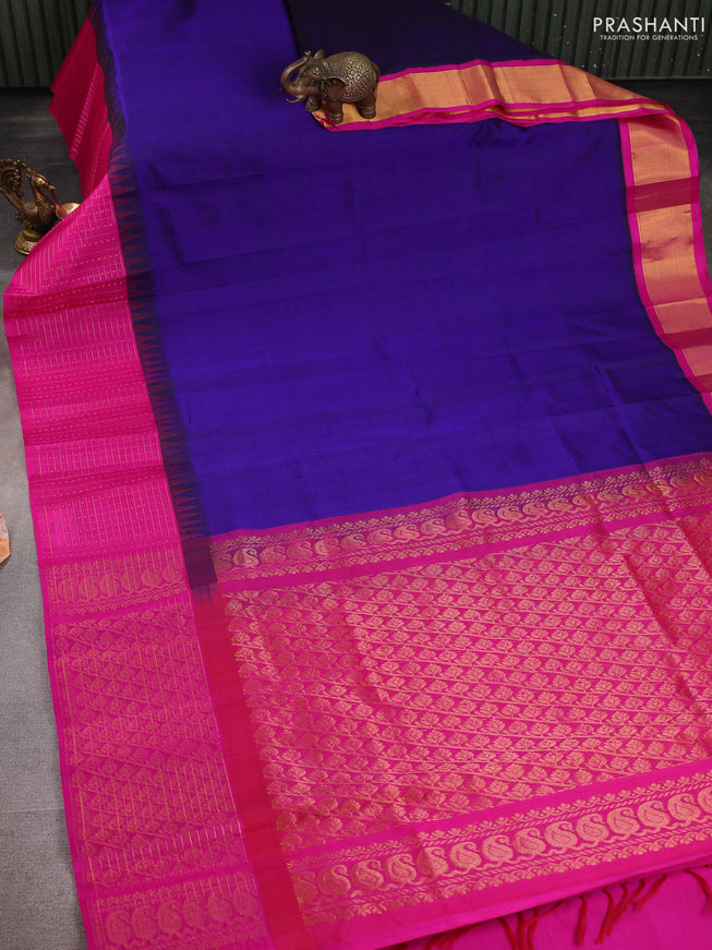 Kuppadam silk cotton saree navy blue and pink with plain body and temple design zari checked border
