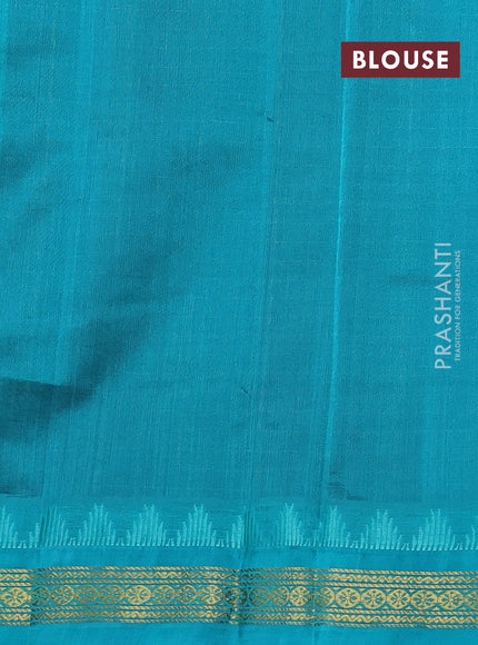Kuppadam silk cotton saree black and teal blue with allover zari checks & lakshadeepam weaves and zari woven border