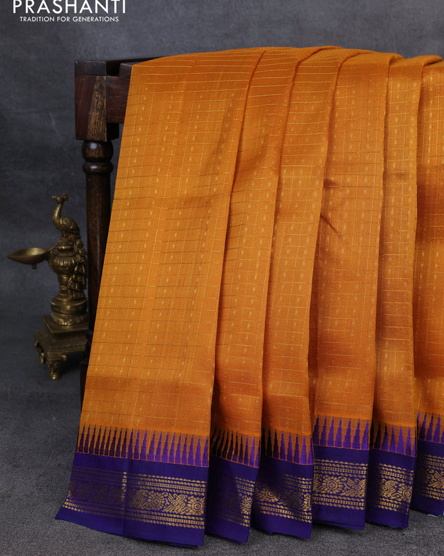 Kuppadam silk cotton saree mustard yellow and blue with allover zari checks & lakshadeepam weaves and zari woven border