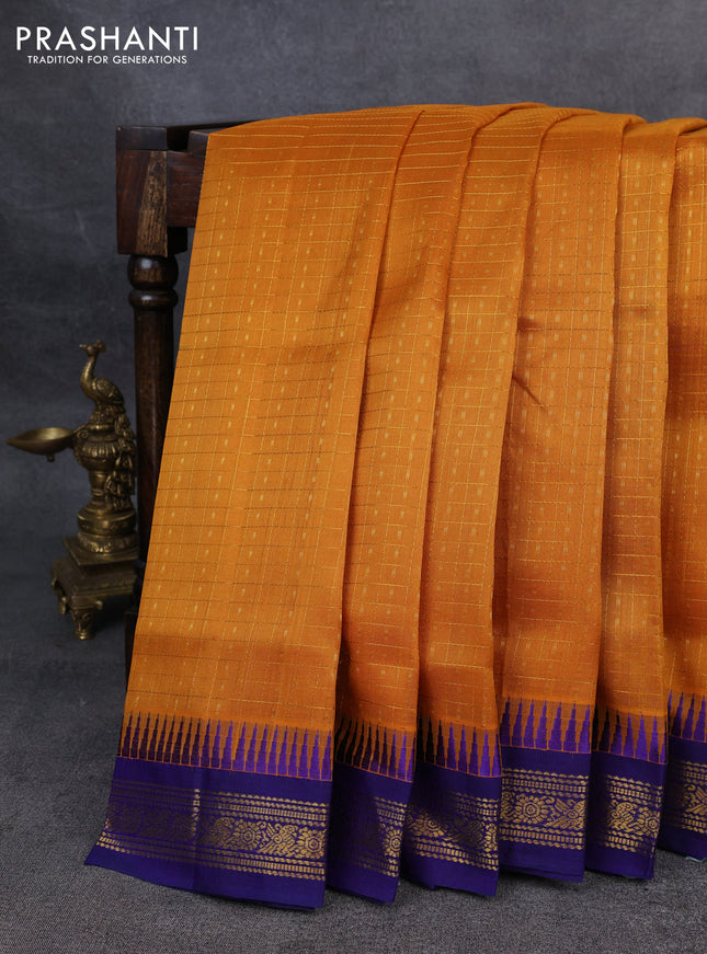 Kuppadam silk cotton saree mustard yellow and blue with allover zari checks & lakshadeepam weaves and zari woven border