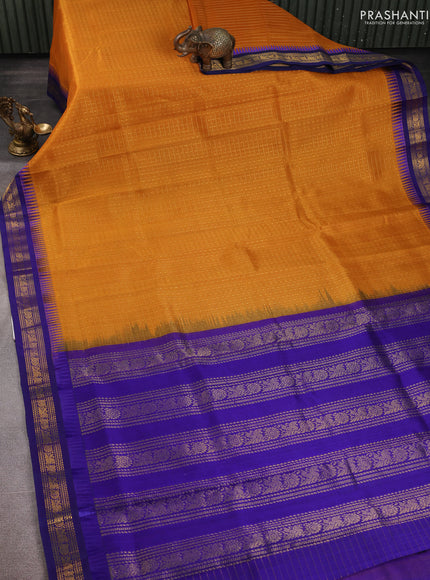 Kuppadam silk cotton saree mustard yellow and blue with allover zari checks & lakshadeepam weaves and zari woven border