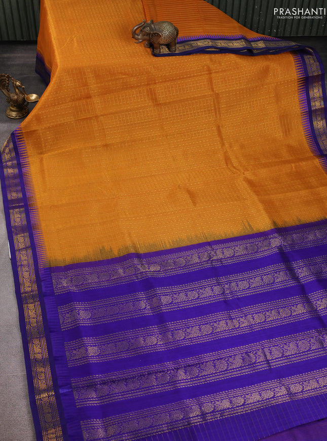 Kuppadam silk cotton saree mustard yellow and blue with allover zari checks & lakshadeepam weaves and zari woven border