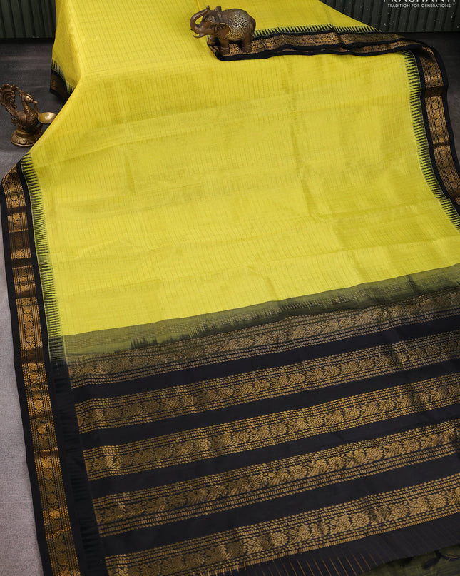 Kuppadam silk cotton saree lime yellow and black with allover zari checks & lakshadeepam weaves and zari woven border