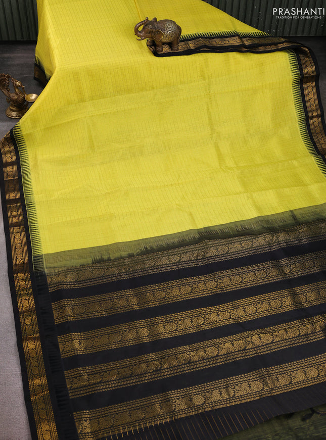 Kuppadam silk cotton saree lime yellow and black with allover zari checks & lakshadeepam weaves and zari woven border